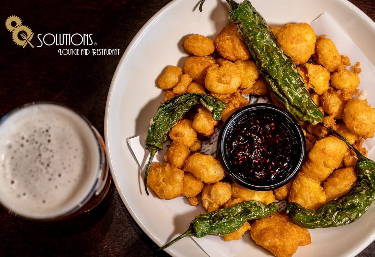 A Larimer Square restaurant favorite: Cheese curds and shishitos at Solutions Lounge & Restaurant