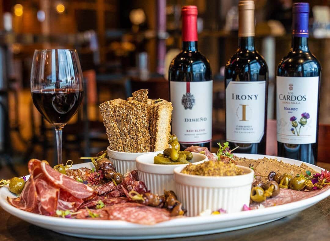 Various wines, cheeses and meats At Solutions Restaurant & Lounge